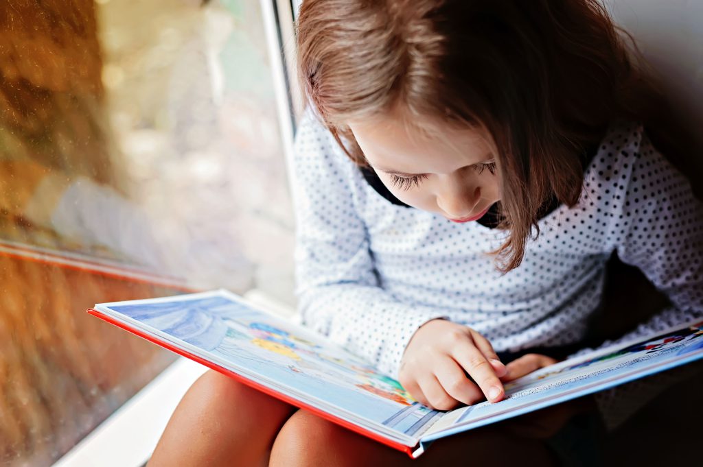 Child learning to read